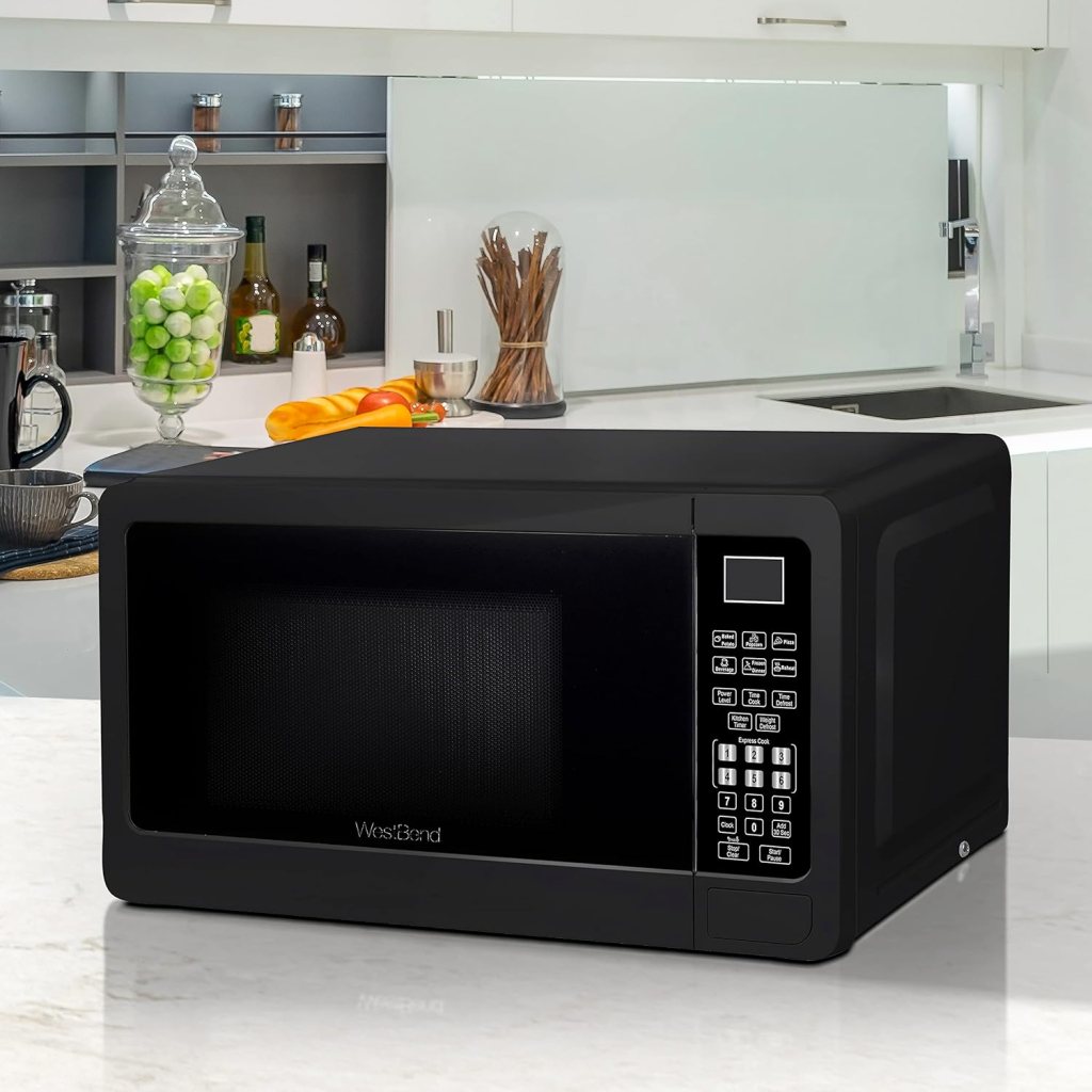 West Bend WBMW71B Microwave Oven 700-Watts Compact with 6 Pre Cooking Settings, Speed Defrost, Electronic Control Panel and Glass Turntable, 0.7-Cu.Ft, Black